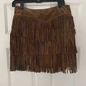 Brown suede, fringe skirt bought from a local boutique and never worn.